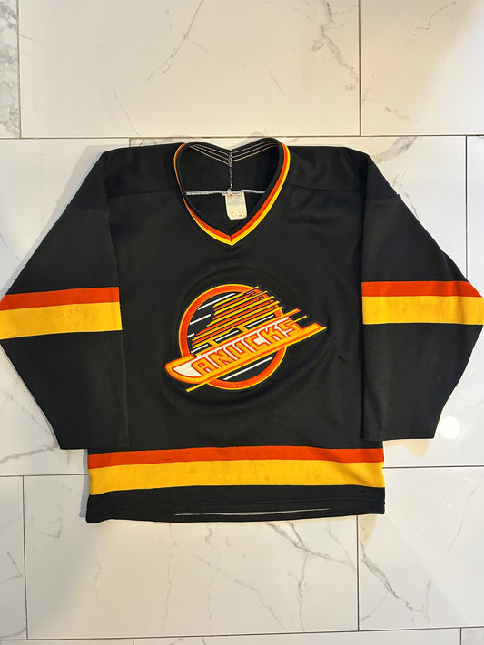 Vintage 90’s CCM Canucks Flying Skate Jersey (M)