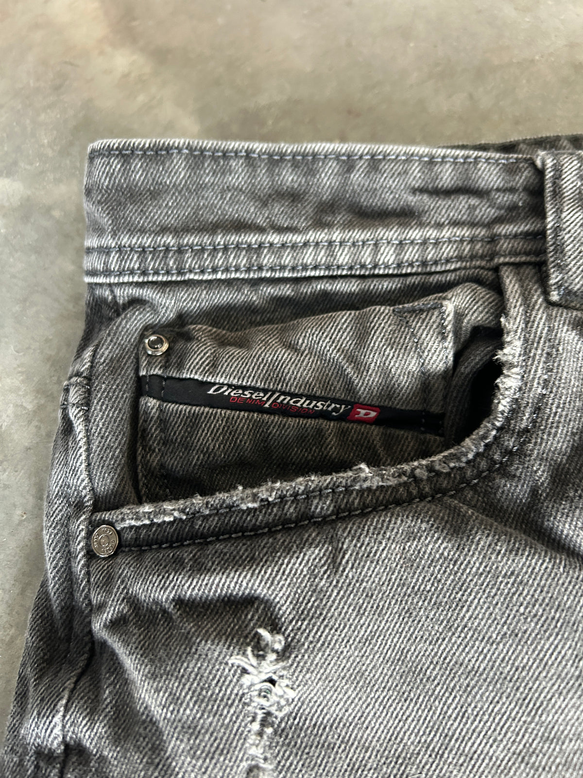 Distressed Faded Grey Diesel Jeans (34x30)