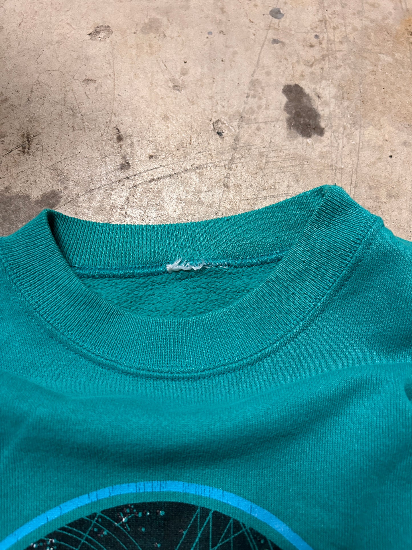 Vintage 1986 Aeire Designs Turquoise Space Dolphins Crewneck (L)