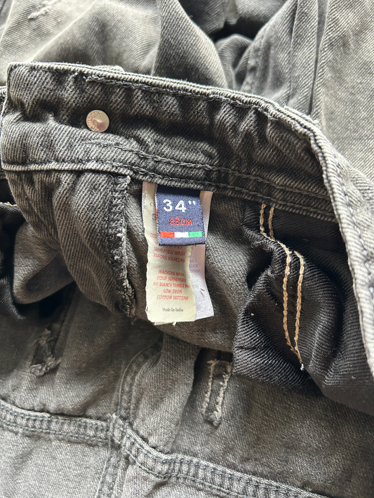 Distressed Faded Grey Diesel Jeans (34x30)