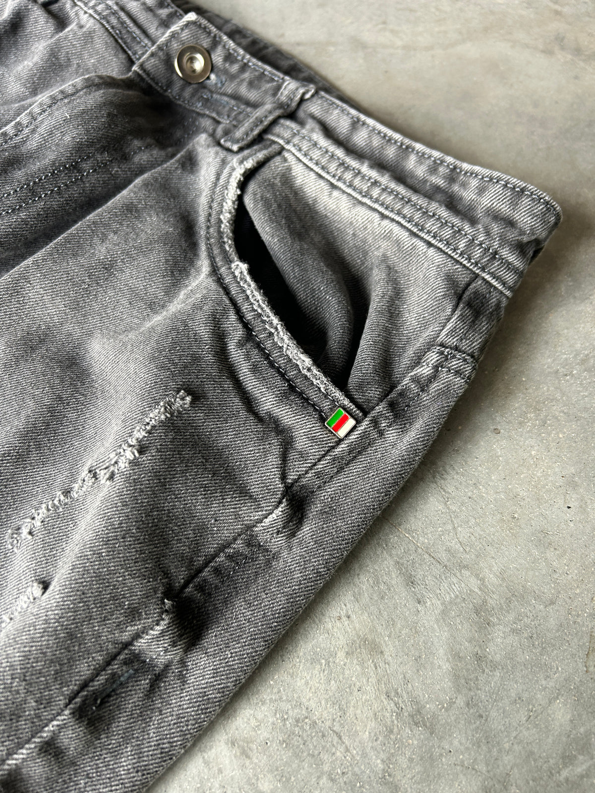 Distressed Faded Grey Diesel Jeans (34x30)