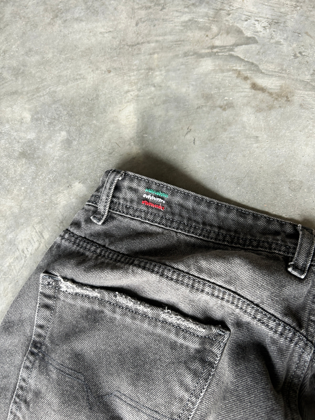 Distressed Faded Grey Diesel Jeans (34x30)
